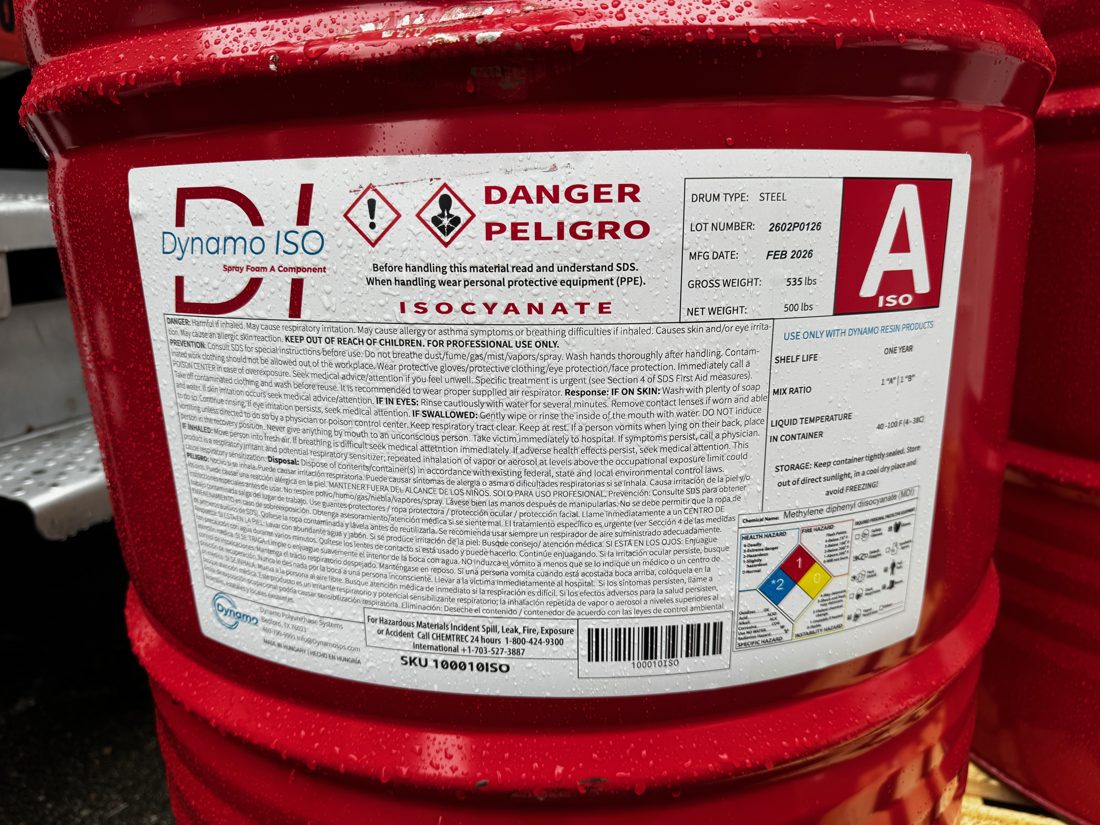 Steel drum of A-side isocyanate for spray polyurethane foam with danger and safety labels