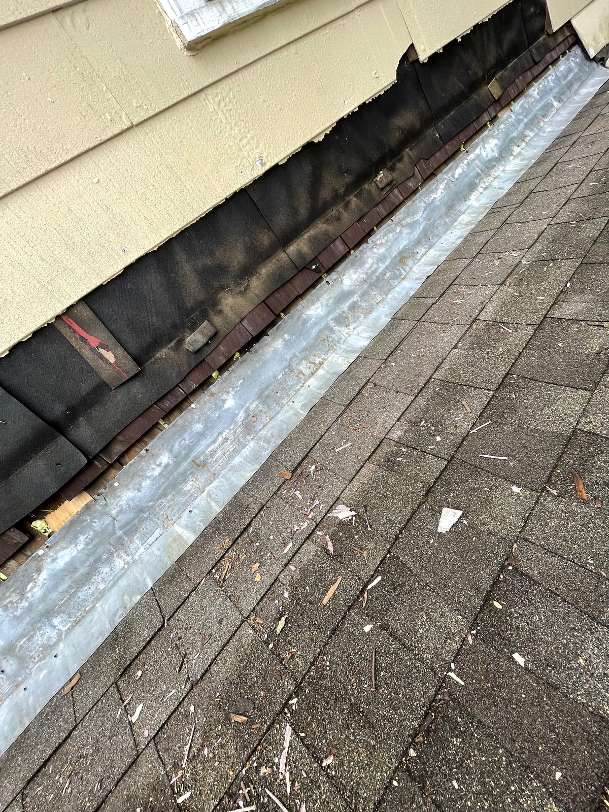 Old wood siding opened up during an exterior repair on an older home