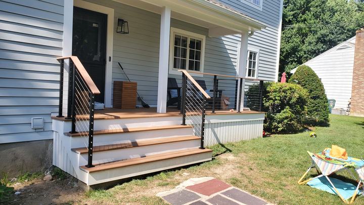 Front steps and walkway of a renovated home that must be kept clear of snow