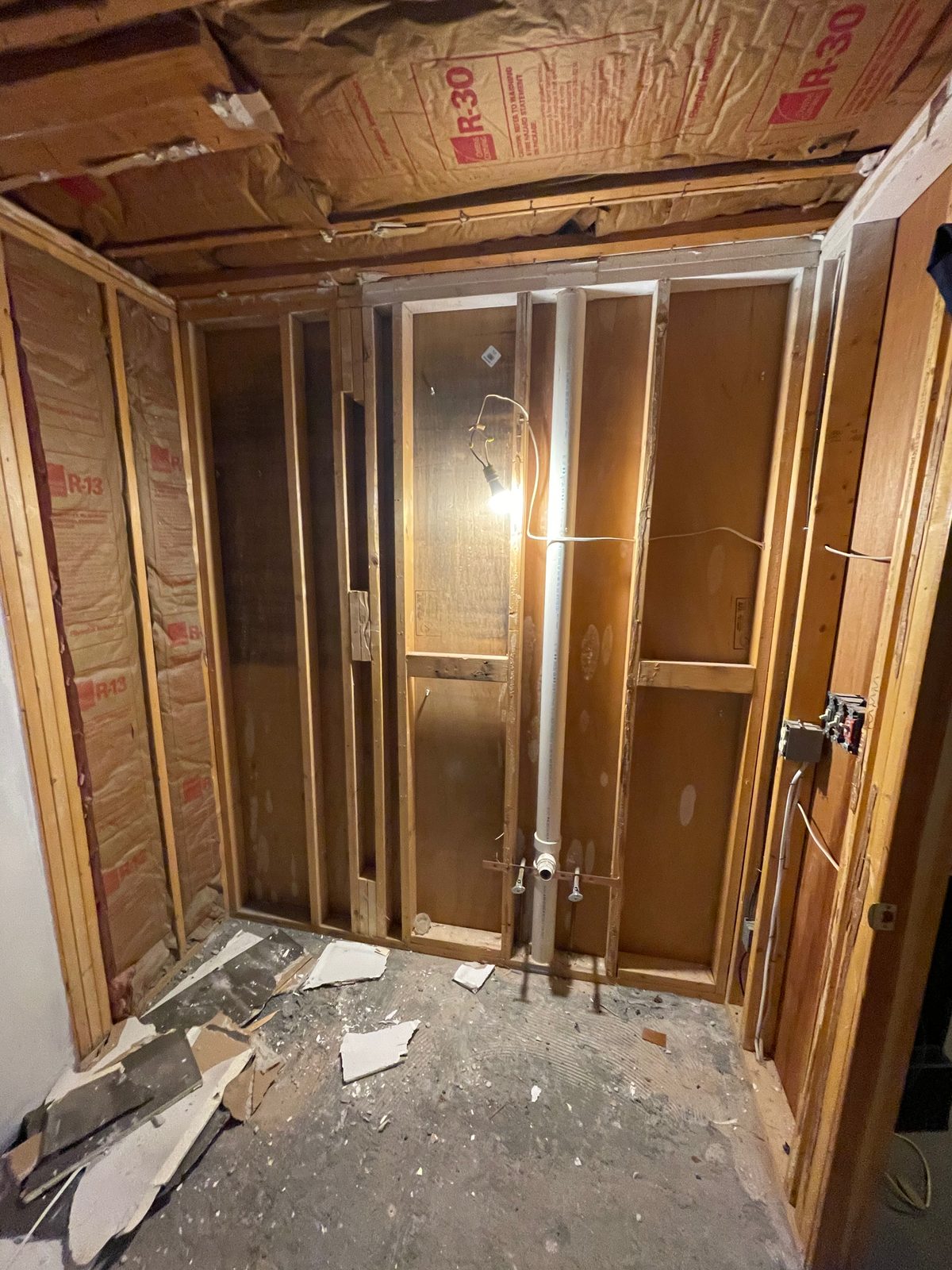 Bathroom gutted down to the studs during a full renovation